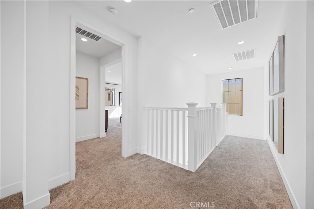 210 Sutters Mill Irvine, CA 92602 - Photo 30 of 46 en view interior of a house with wooden floor