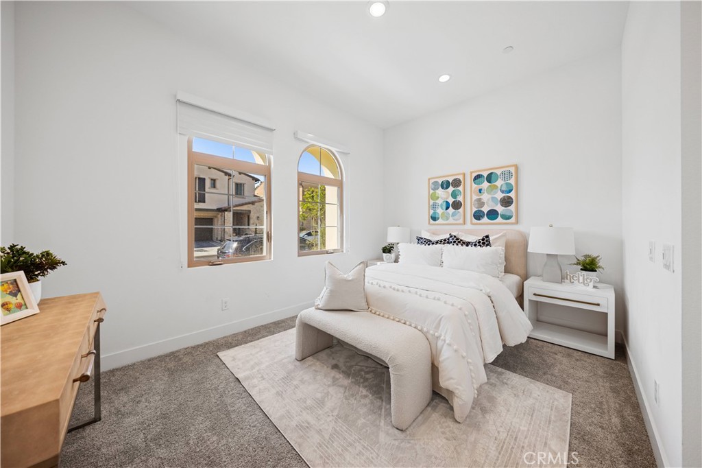 210 Sutters Mill Irvine, CA 92602 - Photo 3 of 46 a bedroom with a bed and a window
