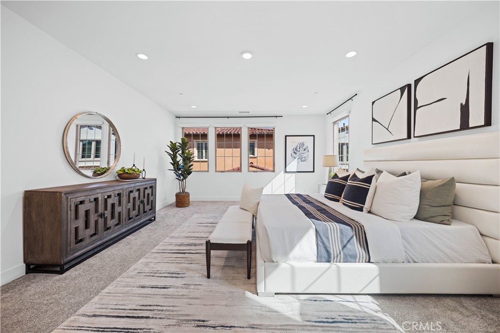 210 Sutters Mill Irvine, CA 92602 - Photo 37 of 46 a bedroom with furniture and a window