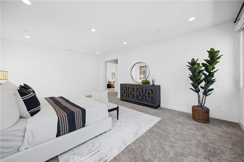 210 Sutters Mill Irvine, CA 92602 - Photo 38 of 46 a living room with furniture a potted plant and a rug