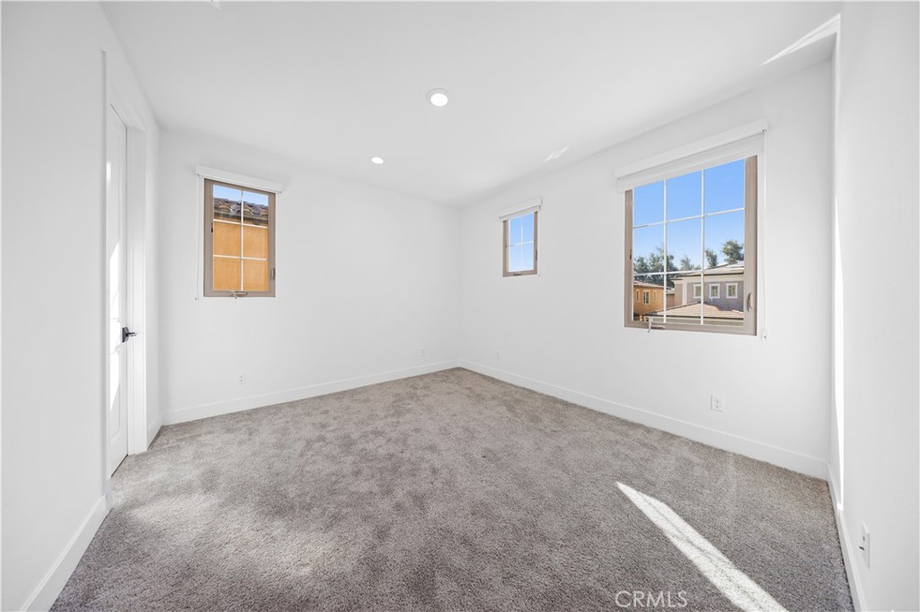 210 Sutters Mill Irvine, CA 92602 - Photo 41 of 46 an empty room with a painting on the wall