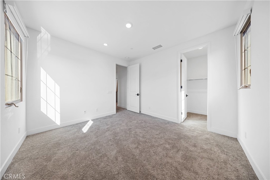 210 Sutters Mill Irvine, CA 92602 - Photo 42 of 46 a view of an empty room with a window