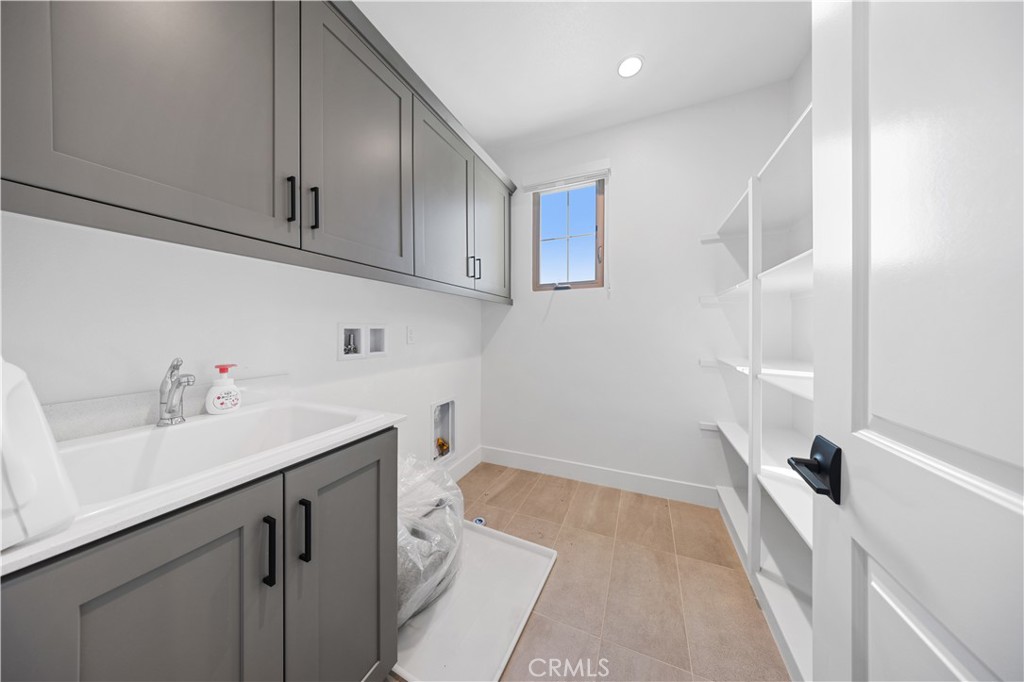210 Sutters Mill Irvine, CA 92602 - Photo 43 of 46 a hallway with cabinets