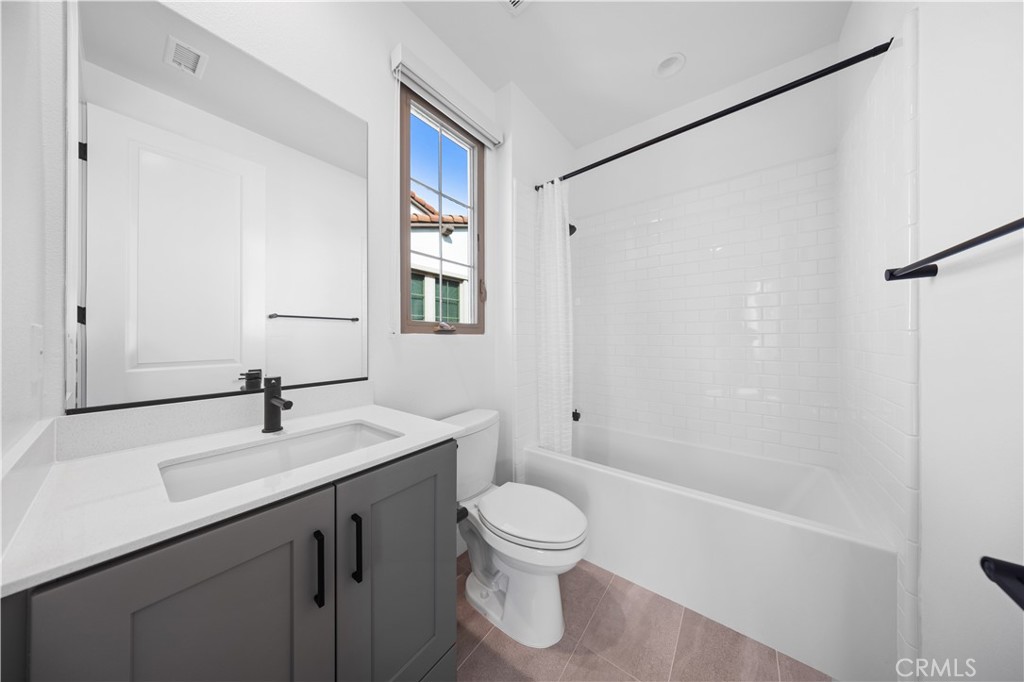 210 Sutters Mill Irvine, CA 92602 - Photo 46 of 46 a bathroom with a sink a toilet and shower