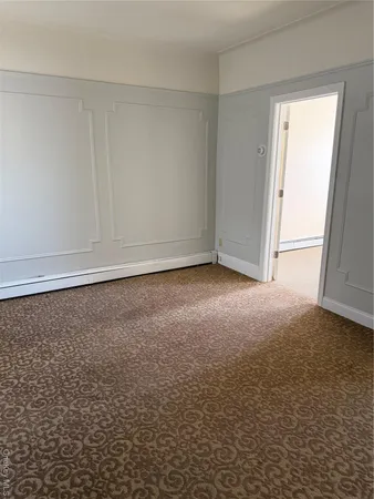 an empty room with a natural light