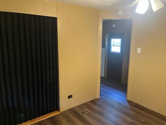 a view of a livingroom with wooden floor