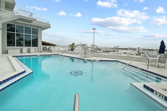 a view of a swimming pool with a lake view