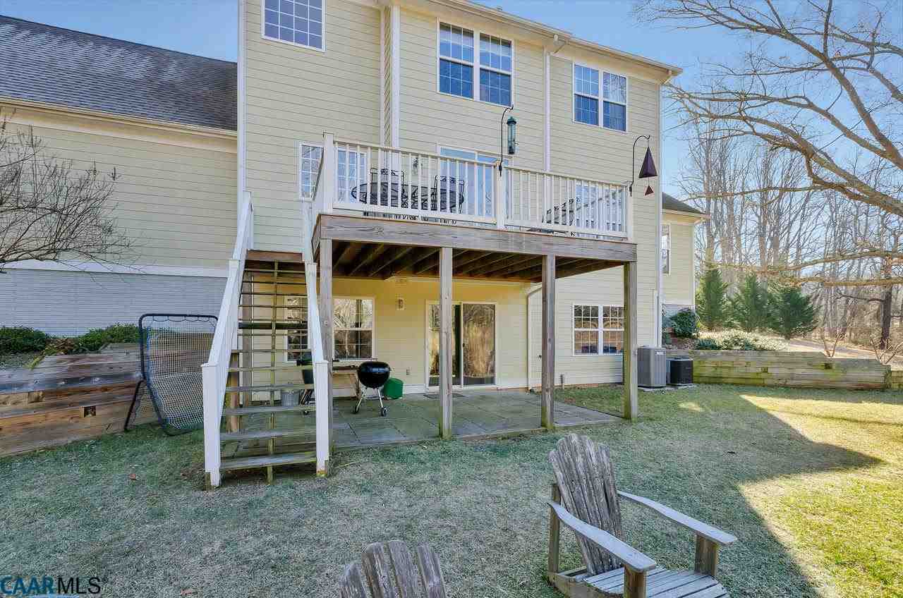 2901 Free Union Road Charlottesville, VA 22901 - Photo 39 of 48 a view of a house with a backyard and a chair
