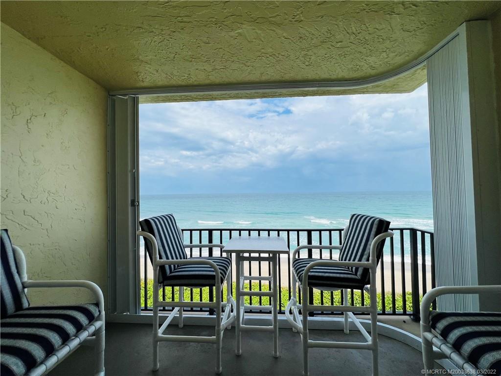 7430 South Ocean Drive, Unit 619B Jensen Beach, FL 34957 - Photo 17 of 57 a view of a balcony with chairs