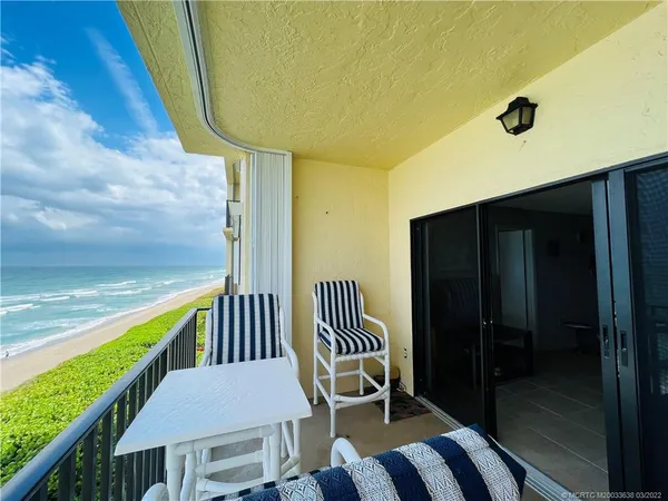 a view of an ocean from a balcony