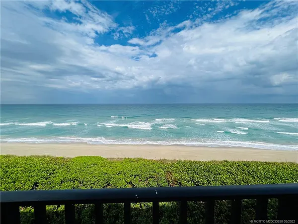 a view of an ocean from a yard
