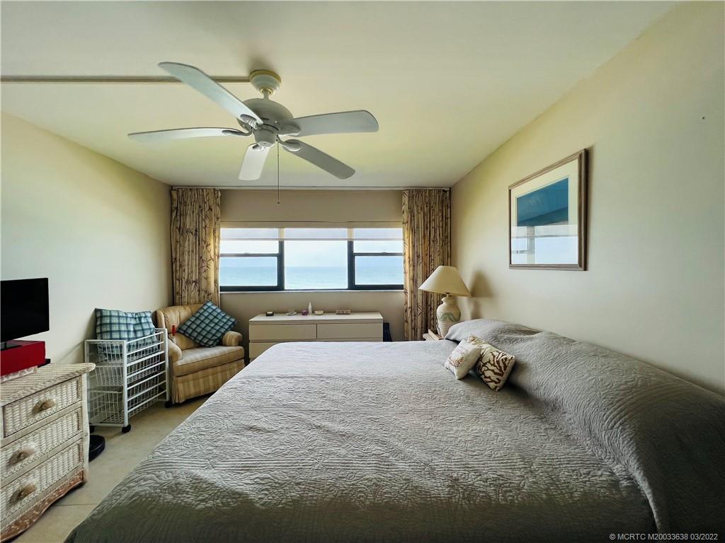 7430 South Ocean Drive, Unit 619B Jensen Beach, FL 34957 - Photo 28 of 57 a bedroom with furniture and a window