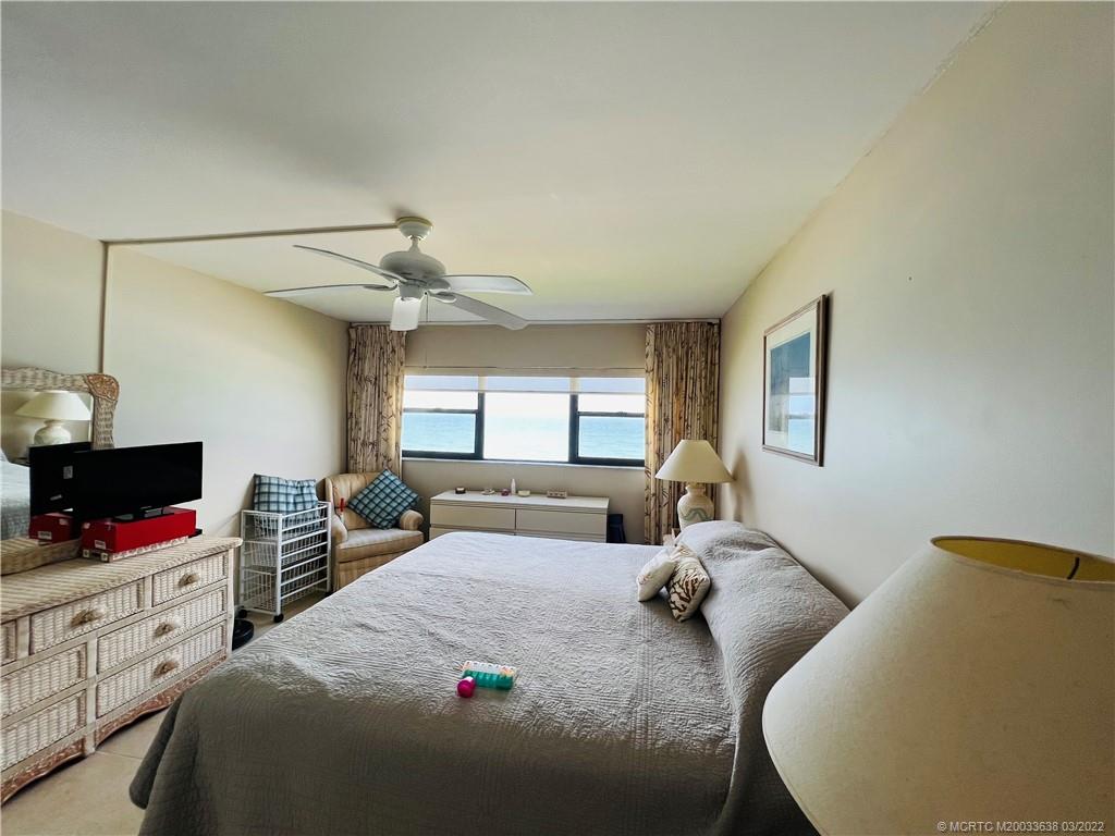 7430 South Ocean Drive, Unit 619B Jensen Beach, FL 34957 - Photo 31 of 57 a bedroom with two bed and a flat screen tv
