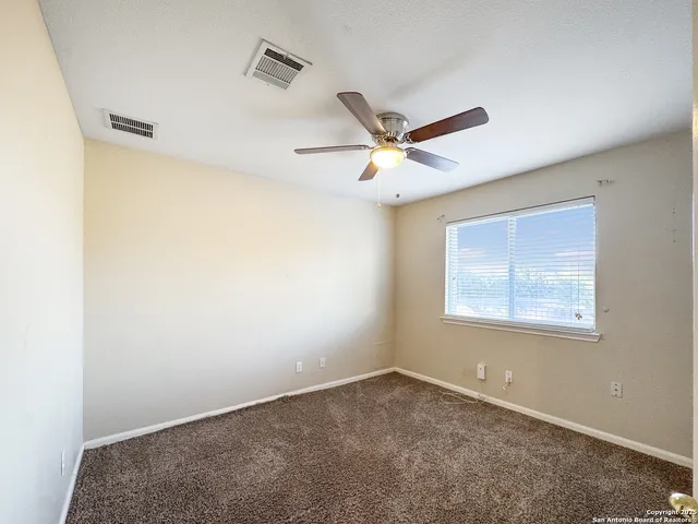 an empty room with a window