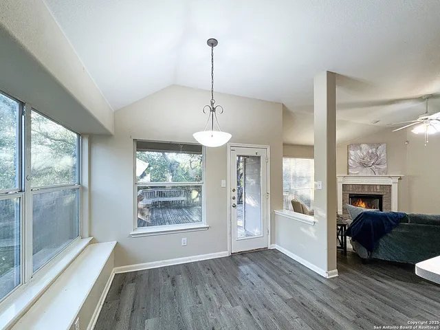 a view of livingroom with furniture wooden floor and a chandelier