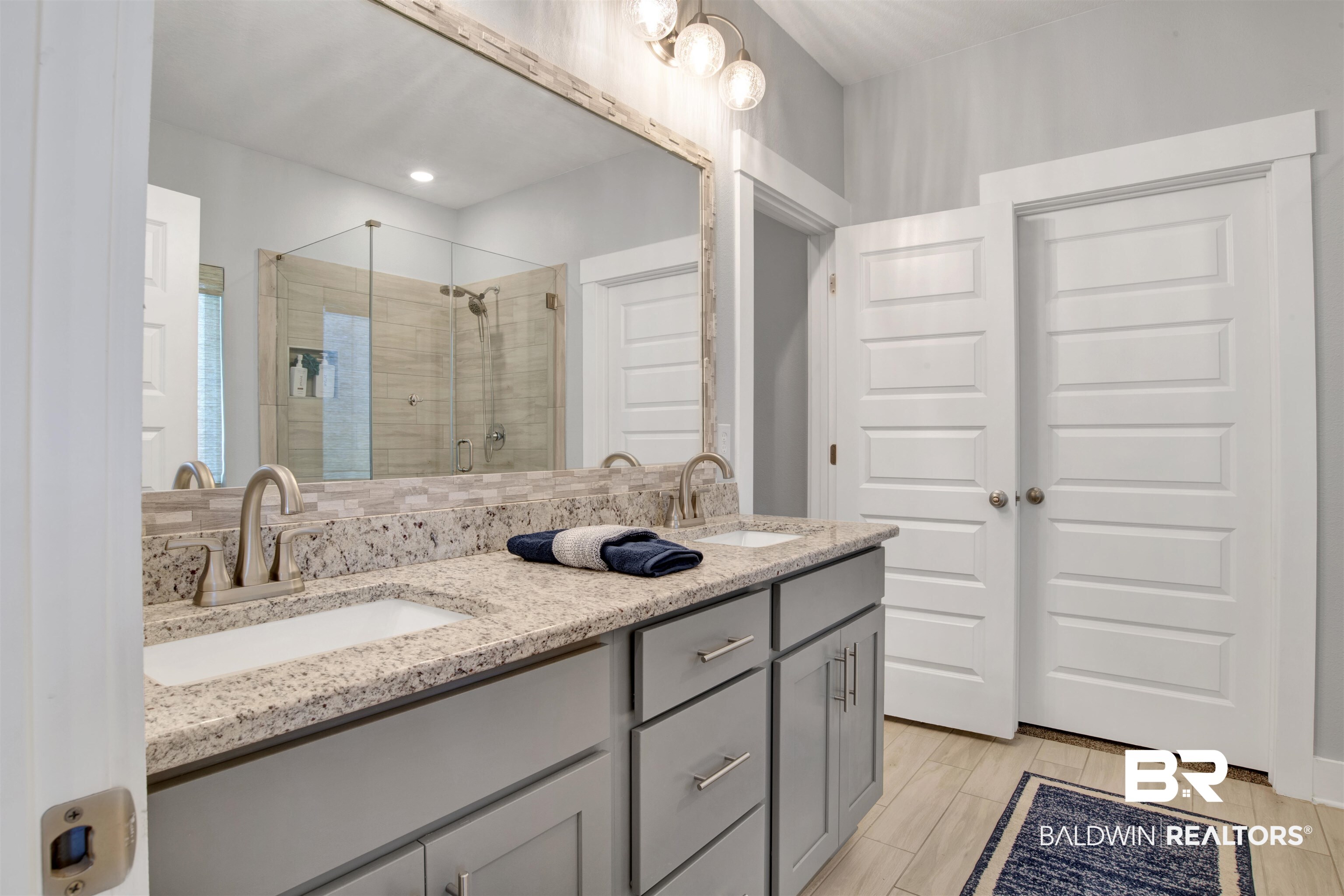 10113 Lakeview Drive Foley, AL 36535 - Photo 21 of 34 Bathroom with walk in shower and vanity