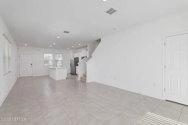 a bathroom with a sink a mirror and vanity