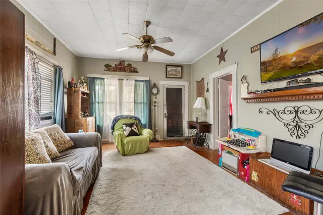 a bedroom with bed and window