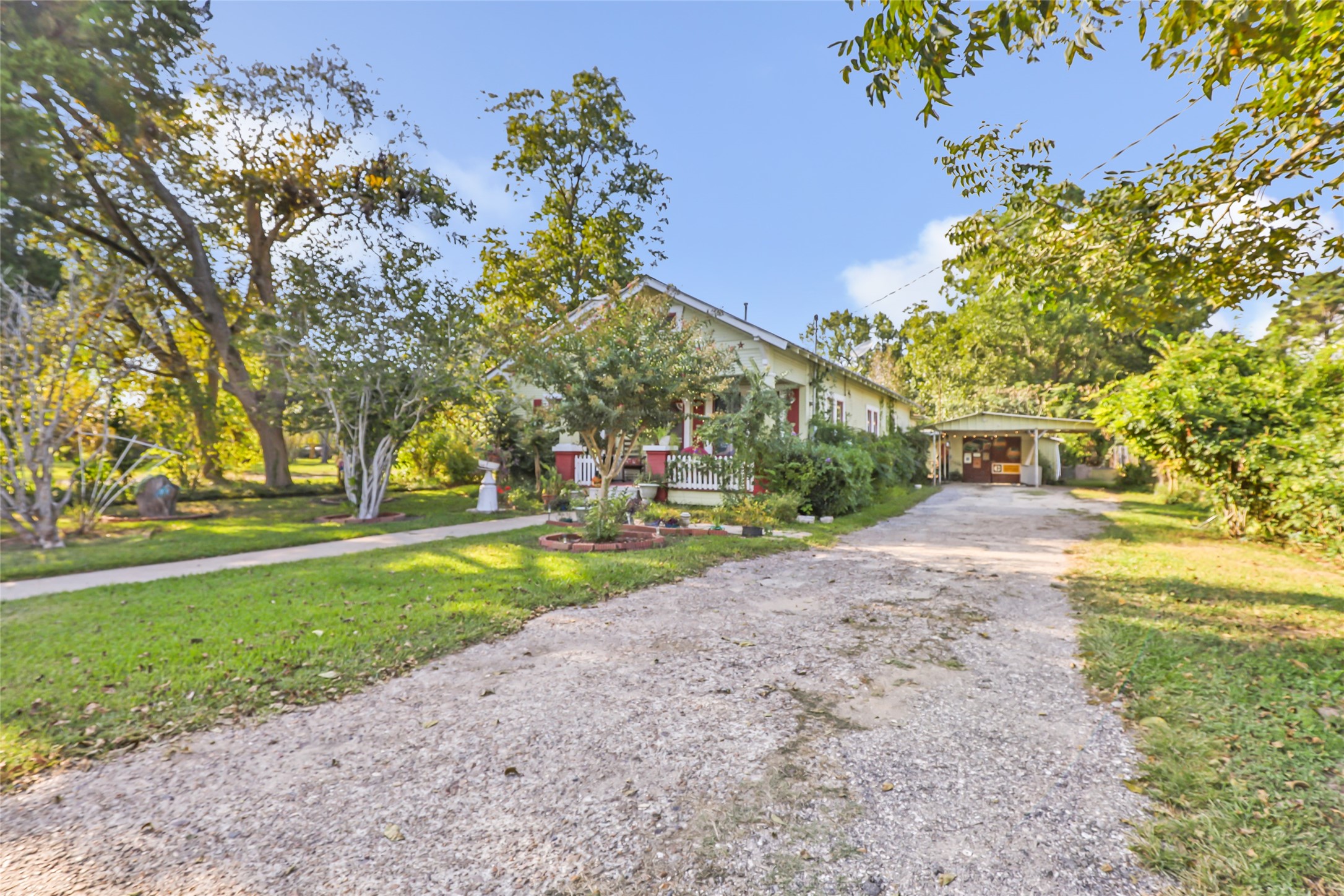 200 East Linney Street, Unit 202 Dayton, TX 77535 - Photo 2 of 22 a view of a park with large trees