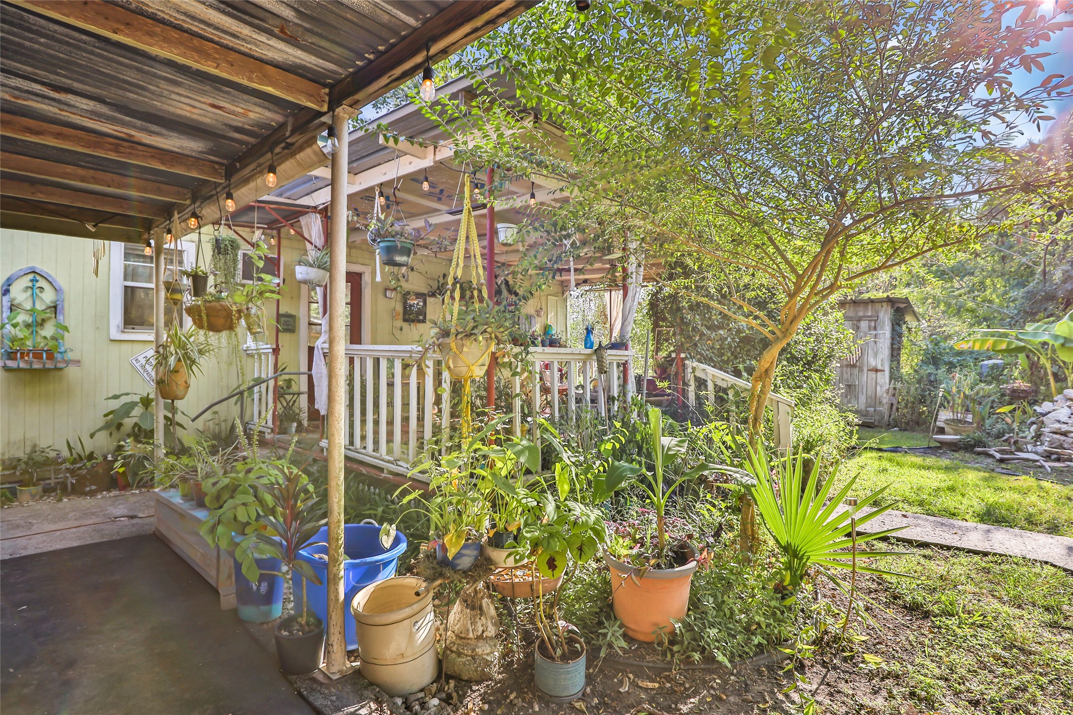 200 East Linney Street, Unit 202 Dayton, TX 77535 - Photo 5 of 22 a vase of flowers sitting on a floor in front of a house