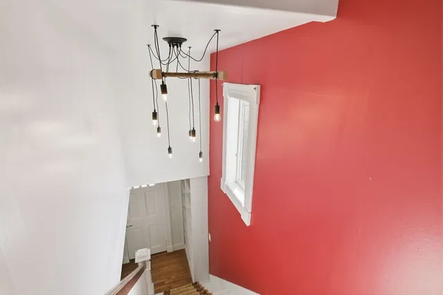 a balcony with wooden floor