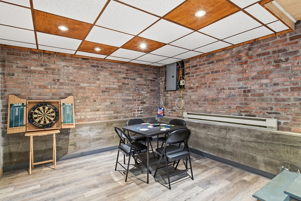 1201 Allen Street Springfield, MA 01118 - Photo 34 of 42 a dining room with a table and chairs