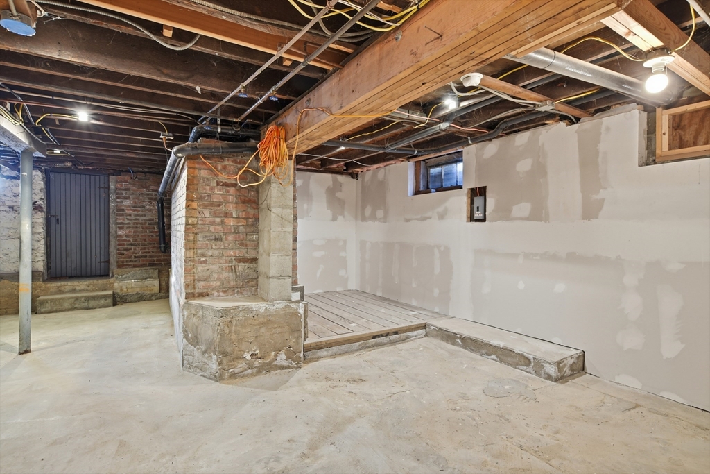 1201 Allen Street Springfield, MA 01118 - Photo 36 of 42 a view of a room with wooden walls