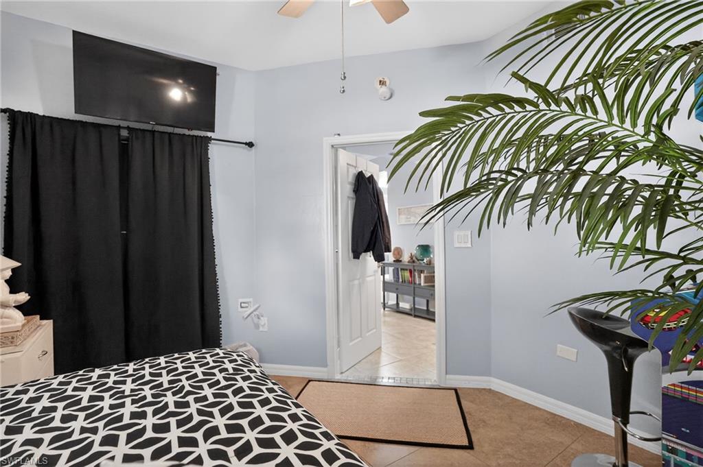 519 Roma Court, Unit 3101 Naples, FL 34110 - Photo 19 of 30 a view of entryway and hall with wooden floor