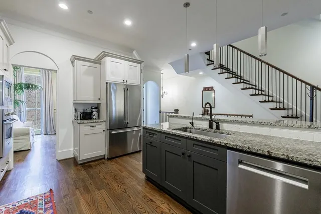a living room with furniture fireplace and flat screen tv