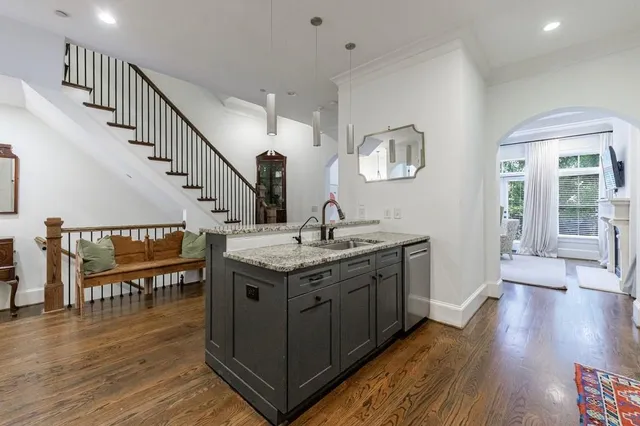 a living room with furniture fireplace and a flat screen tv