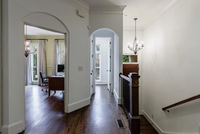 a view of a livingroom with furniture window and wooden floor