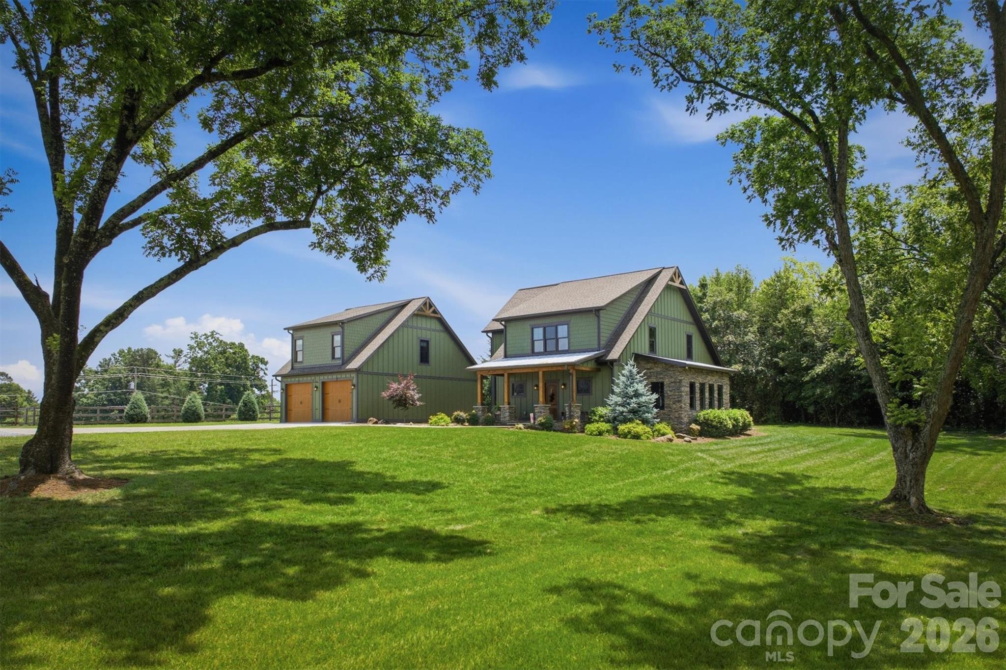 7490 Oak Ridge Church Road Connelly Springs, NC 28612 - Photo 1 of 44 a view of a house with a yard