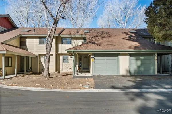 a view of a house with garage