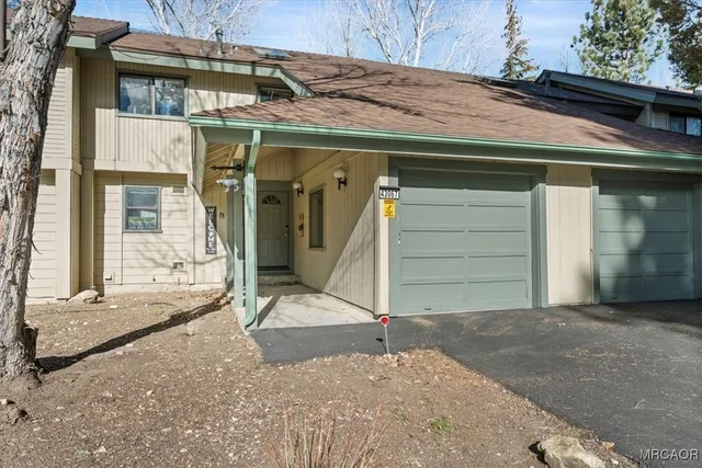 a view of a house with garage
