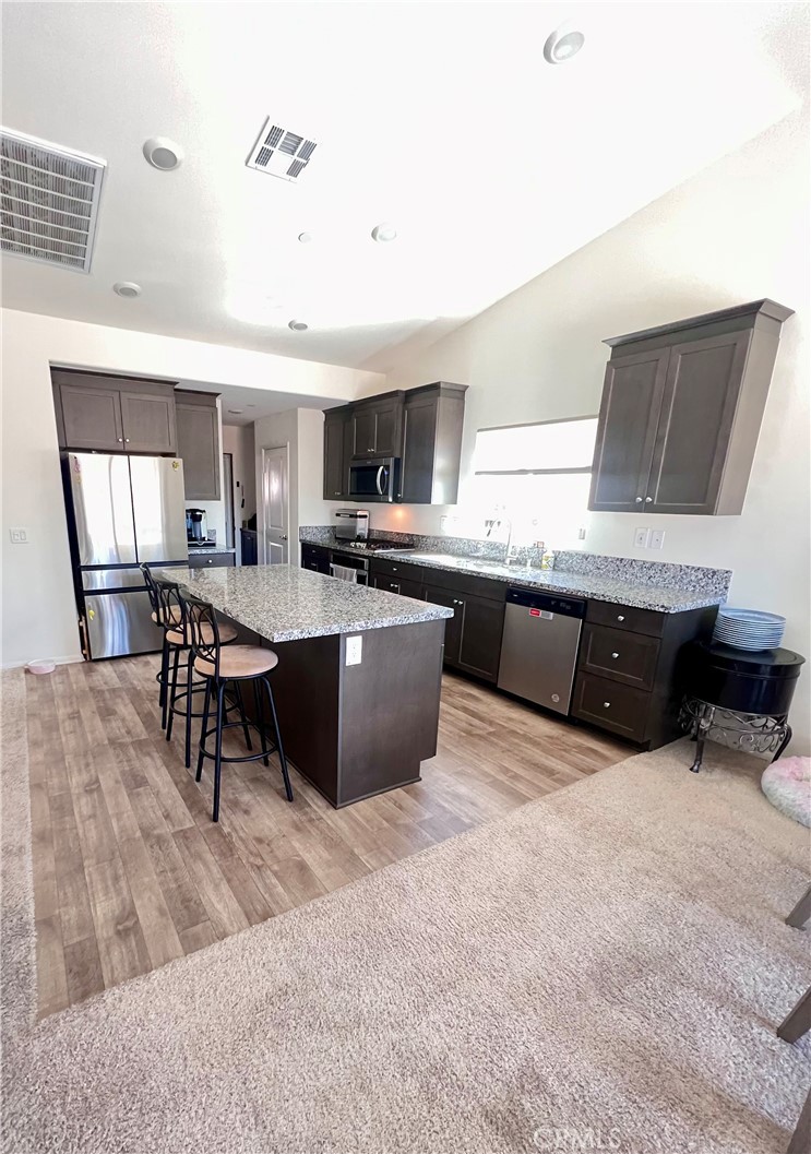 31381 Linden Flower Road Winchester, CA 92596 - Photo 6 of 33 Spacious Kitchen with easy access to garage and to laundry room.