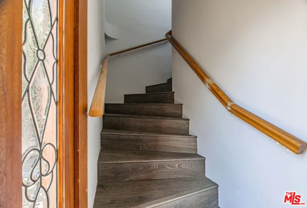 a view of entryway with stairs