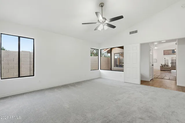 a view of a livingroom with a staircase