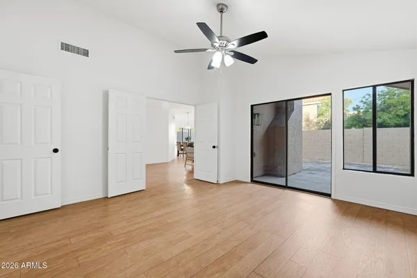 an empty room with fan