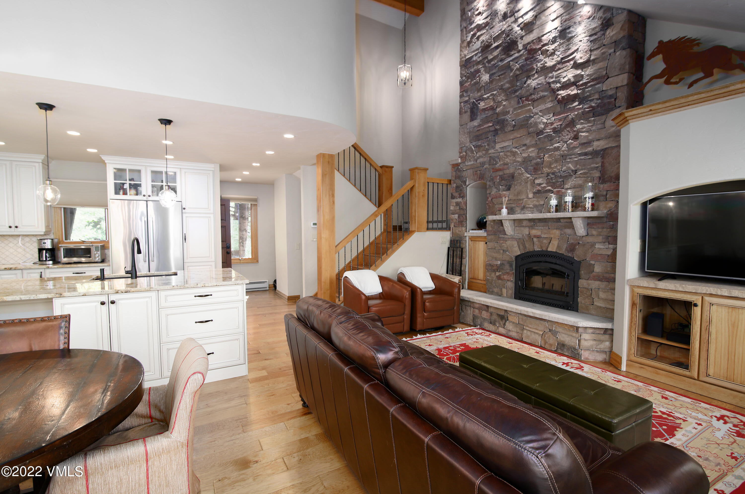 2875 Manns Ranch Road, Unit H3 Vail, CO 81657 - Photo 4 of 18 a living room with furniture and a fireplace