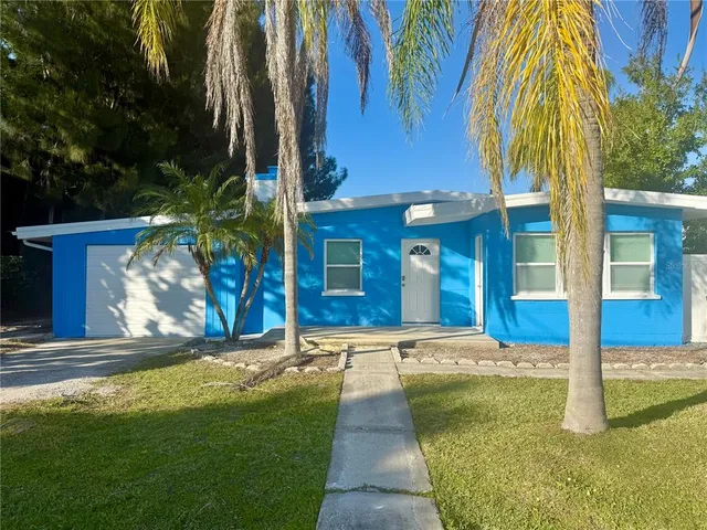 a view of a house with a swimming pool