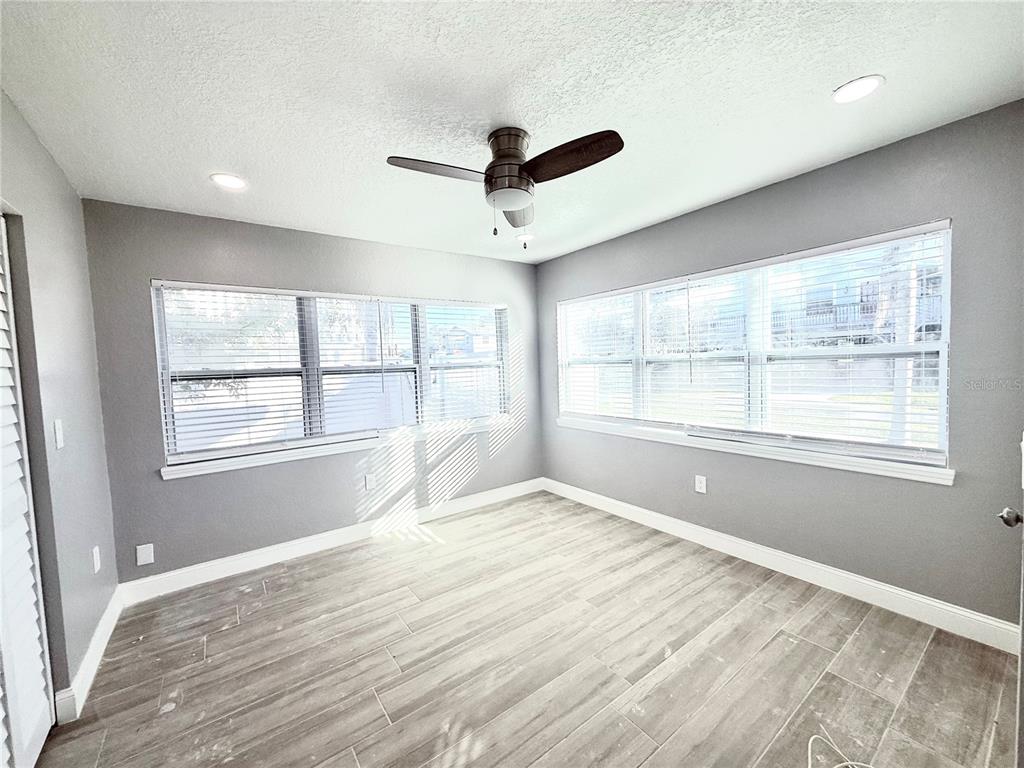 120 Grace Street Crystal Beach, FL 34681 - Photo 10 of 12 a view of an empty room with a window