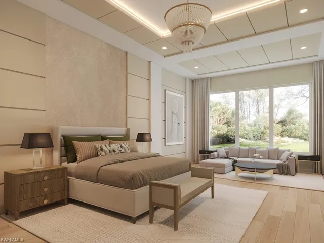 a bedroom with furniture and a large window