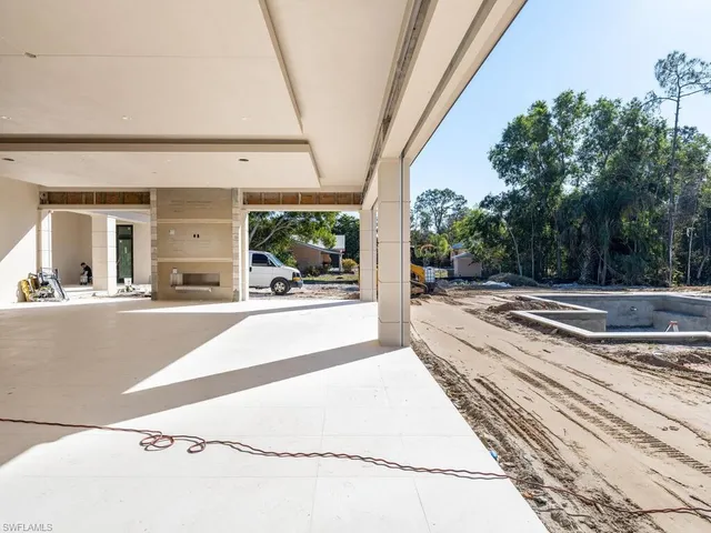 a view of a living room and a garage