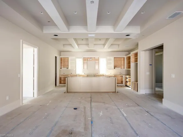 a view of a livingroom with furniture and cabinet