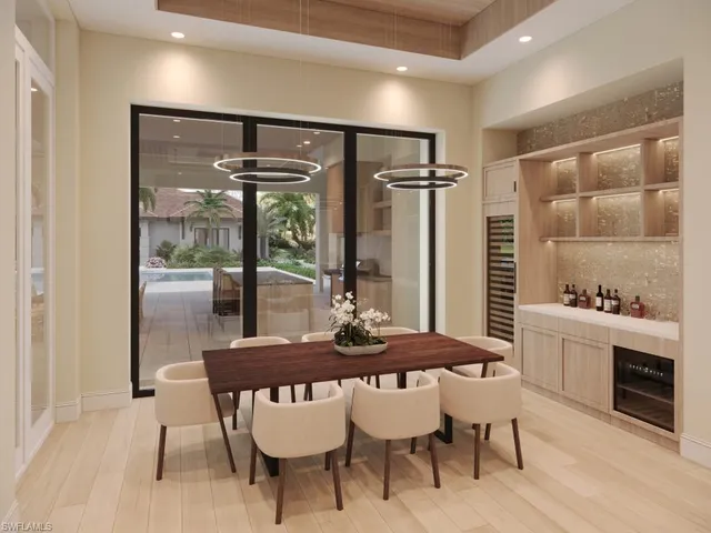 a dining room with furniture and window