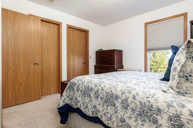 a view of a deck with wooden floor and seating space