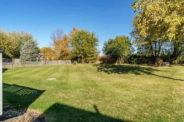 a garden view with a fountain