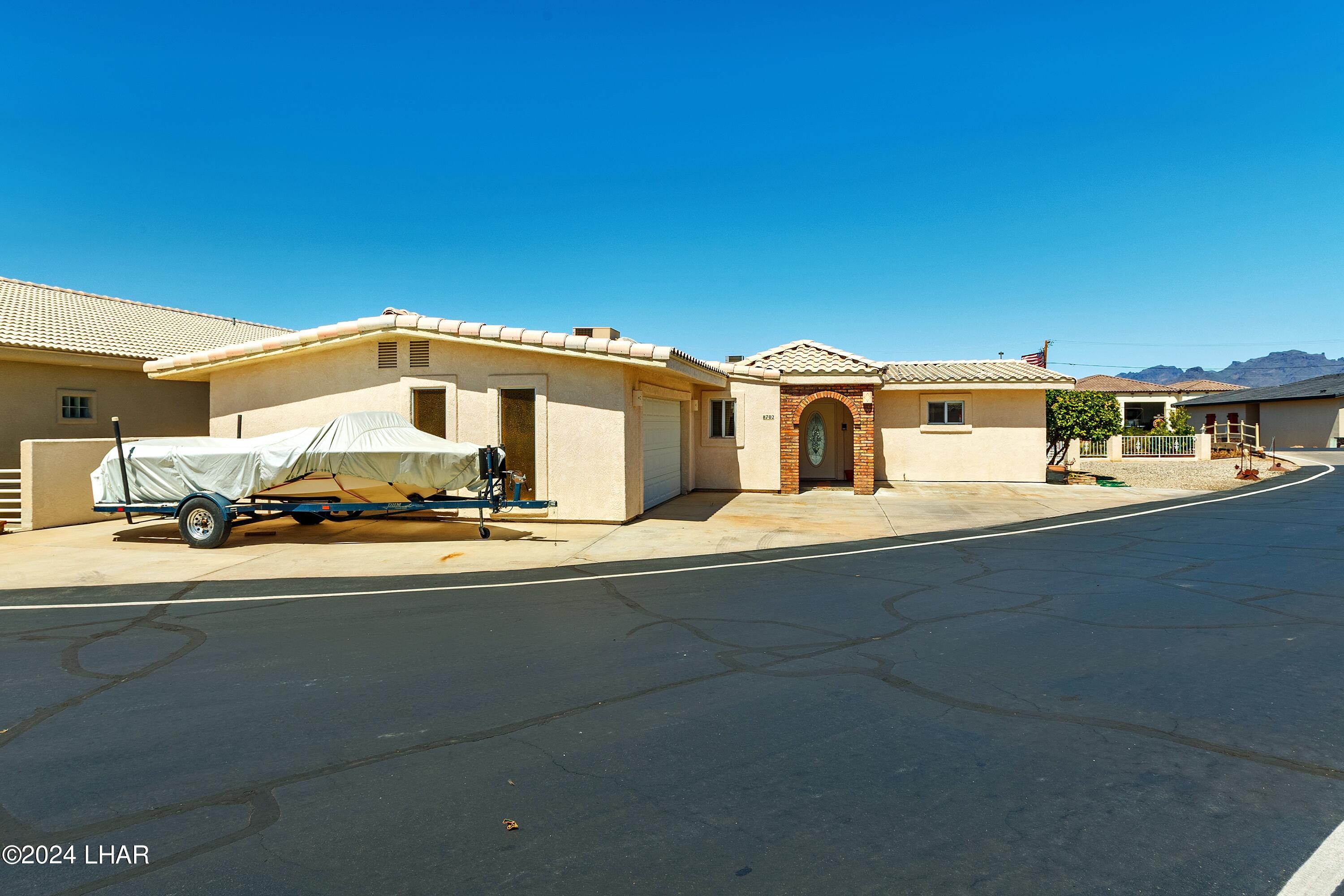 8702 Papago Loop Parker, AZ 85344 - Photo 12 of 36 a large building with a street view