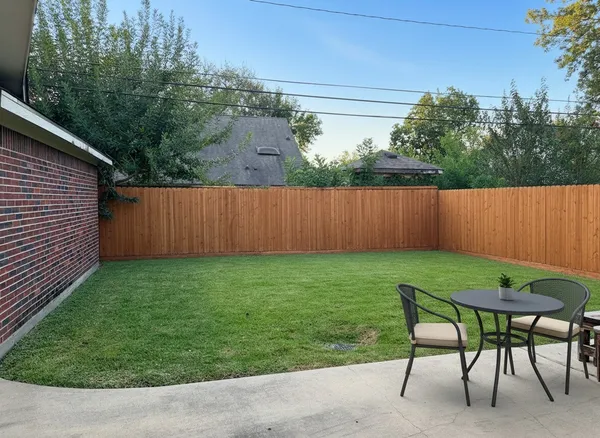 a view of outdoor space and yard