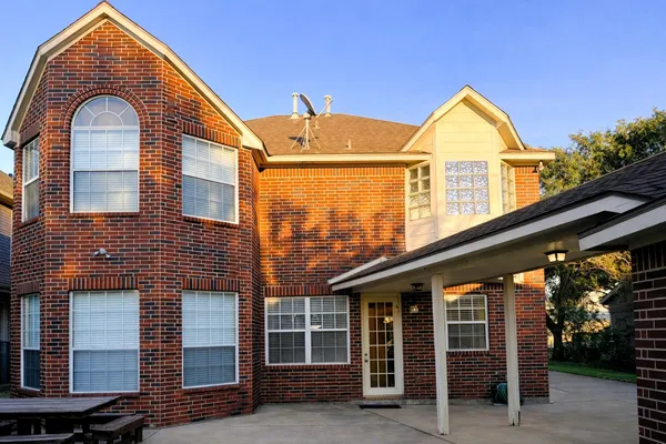 a view of a house with a porch